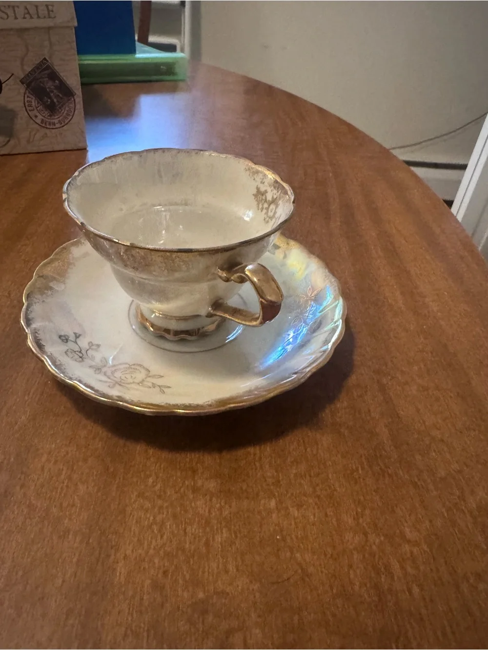 Porcelain Teacup and Saucer Set in White with Gold Trim